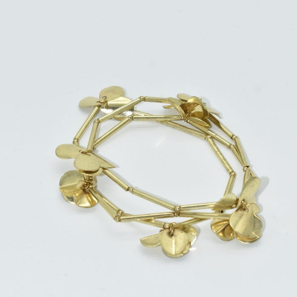 GOUDEN ARMBAND MET BLOEMETJES