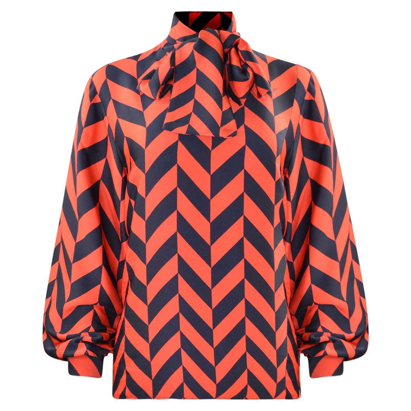 RODE BLOUSE MET BLAUWE VAKKEN